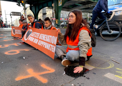 Last generation activists block a road amid a protest in Berlin, Germany April 28, 2023. Photo by Matthias Baehr/REUTERS
