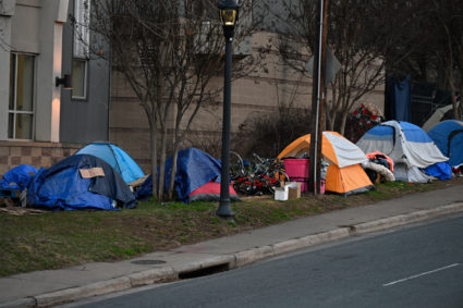 Homeless tents seen on the side of a road in Charlotte, North Carolina.