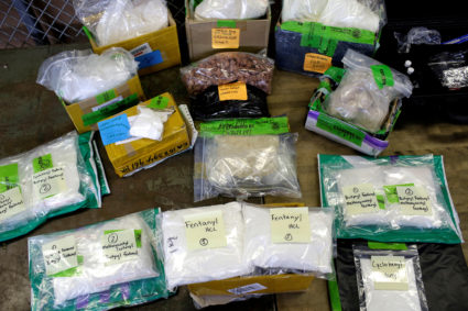 FILE PHOTO: Plastic bags of Fentanyl are displayed on a table at the U.S. Customs and Border Protection area at the Intern...