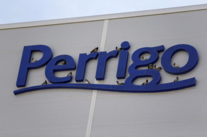 FILE PHOTO: Birds are seen on the logo of generic drugmaker Perrigo Co outside their new factory in the city of Yeruham