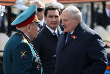 Belarusian President Alexander Lukashenko speaks with a veteran as he attend a military parade on Victory Day, which marks the 78th anniversary of the victory over Nazi Germany in World War Two, in Red Square in central Moscow, Russia May 9, 2023. Photo by Sputnik/Gavriil Grigorov/Pool via REUTERS