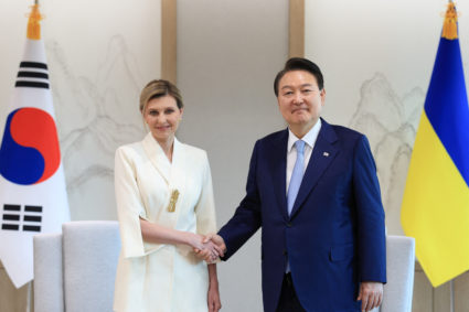 South Korean President Yoon Suk Yeol shakes hands with Ukraine's first lady Olena Zelenska at the Presidential Office in S...
