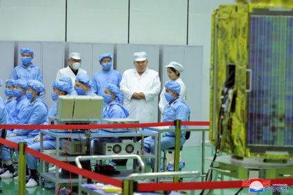 North Korean leader Kim Jong Un and his daughter Kim Ju Ae meet with members of the Non-permanent Satellite Launch Preparatory Committee, as he inspects the country's first military reconnaissance satellite, in Pyongyang, North Korea May 16, 2023, in this image released by North Korea's Korean Central News Agency on May 17, 2023. Photo provided by KCNA via REUTERS