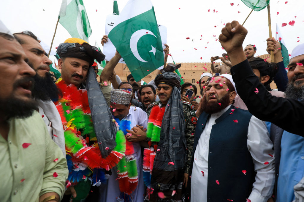 People chant slogans as they attend a rally in support of the Pakistan’s Armed Forces, in Peshawar, Pakistan May 17, 2023....