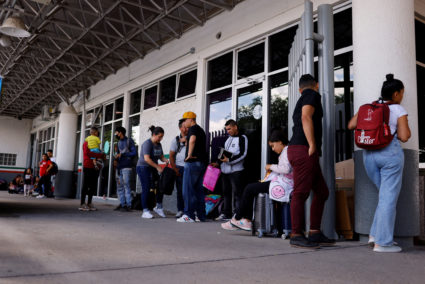 Migrants seeking asylum in the U.S. gather at the Zaragoza-Ysleta international bridge, between Mexico and the United States