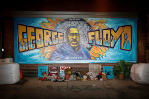 FILE PHOTO: A view of the George Floyd mural at 38th Street and Chicago Avenue a day before opening statements in the tria...