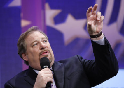 Saddleback Church Pastor Rick Warren participates in a panel discussion during the Clinton Global Initiative in New York