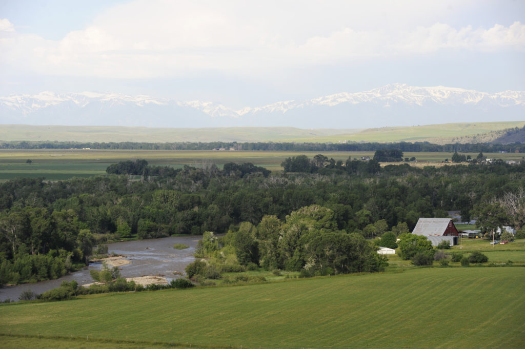 The Yellowstone River flows through rural landscape 15 miles upstream from the site of a ruptured pipeline near Joliet, Mo...
