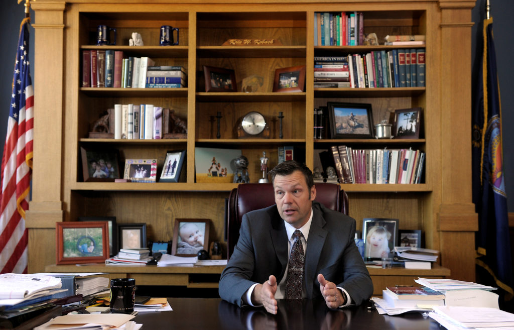 Kansas Secretary of State Kobach talks about the Kansas voter ID law in his Topeka, Kansas office