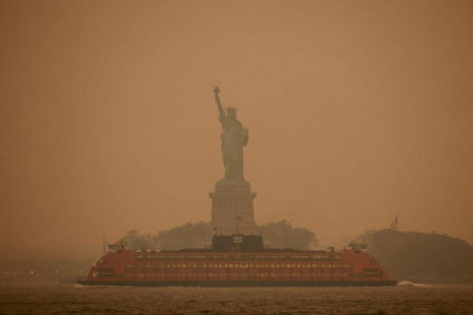 The Statue of Liberty is covered in haze and smoke caused by wildfires in Canada, in New York