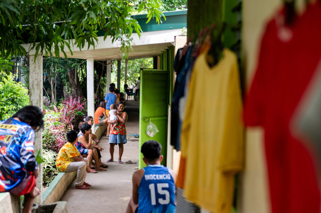 Filipinos evacuate from their houses following the increased alert level of Mayon Volcano