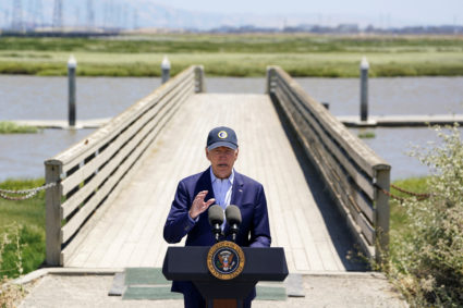 U.S. President Biden speaks about his administration's actions to battle climate change and protect the environment, in Ca...