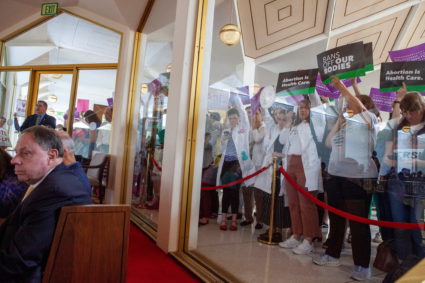 North Carolina Republican lawmakers hold a vote to override Democratic governor's veto of abortion bill