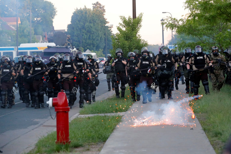 Protesters gather near the Minneapolis Police fifth precinct