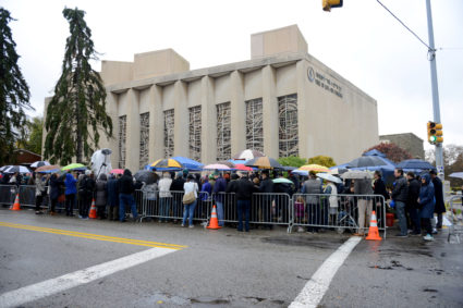People gathered outside the Tree of Life synagogue in Squirrel Hill to hold a vigil a week after a deadly shooting there