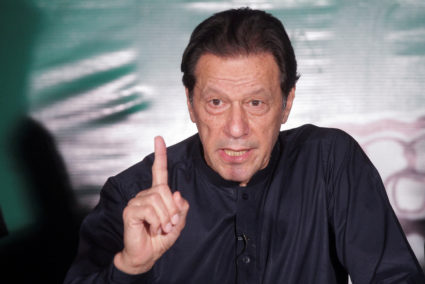 FILE PHOTO: Pakistan's former Prime Minister Imran Khan, gestures as he speaks to the members of the media at his residenc...