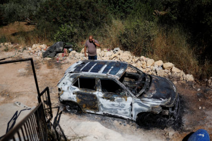 Israeli settlers attack Palestinian town, killing one, in response to fatal shooting