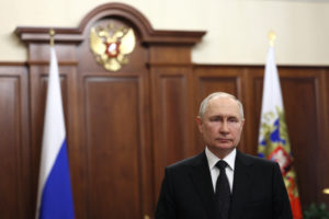Russian President Vladimir Putin gives a televised address in Moscow