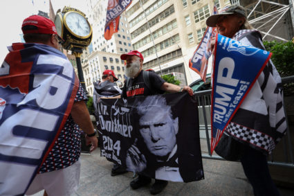 Supporters of former U.S President Donald Trump gather outside Trump Tower in New York