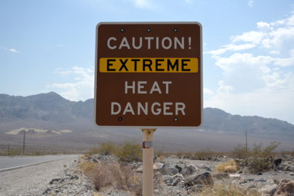 A sign warns of extreme heat in Death Valley