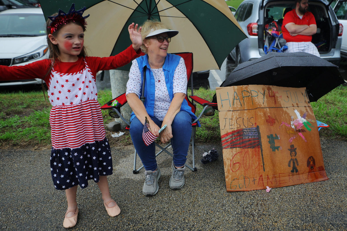Fourth of July revelers across the US brave heat and heavy rain to ...