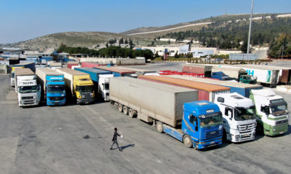 Trucks carrying aid from UN World Food Programme (WFP), following a deadly earthquake, are parked at Bab al-Hawa crossing, Syria February 20, 2023. Photo by Mahmoud Hassano/REUTERS