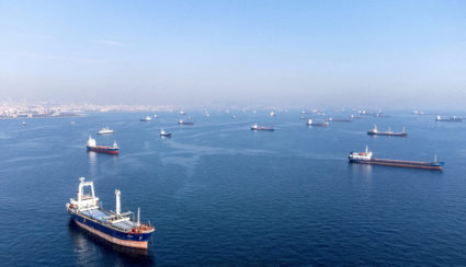 FILE PHOTO: Commercial vessels including vessels which are part of Black Sea grain deal wait to pass the Bosphorus strait ...