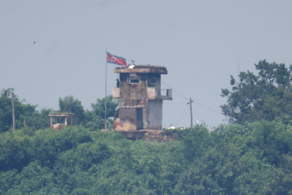 A North Korean soldier stands guard at their guard post in this picture taken near the demilitarized zone separating the t...