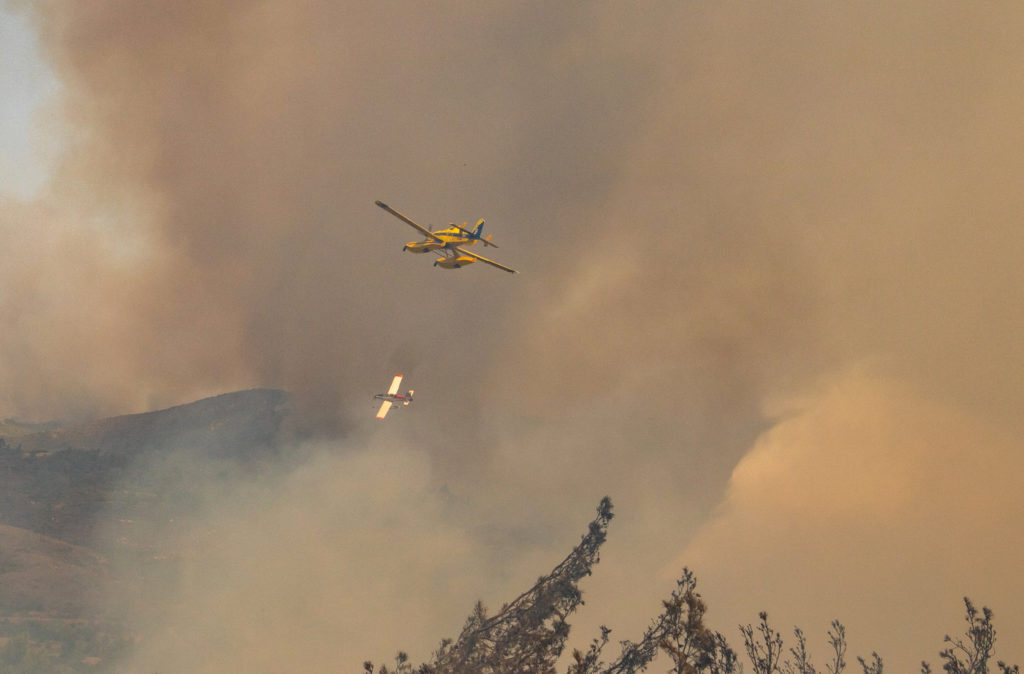 Wildfires burn forests on Greek island of Rhodes