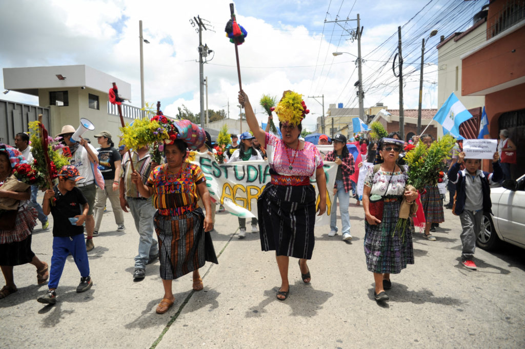 Demonstrators take part in the 'March of the Flowers' against the political persecution of the Guatemalan presidential can...