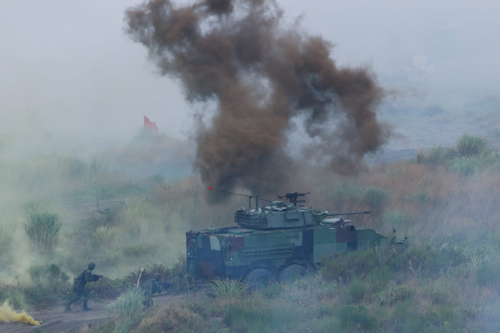 Taiwanese soldiers run during the annual Han Kuang anti-landing drill in New Taipei City