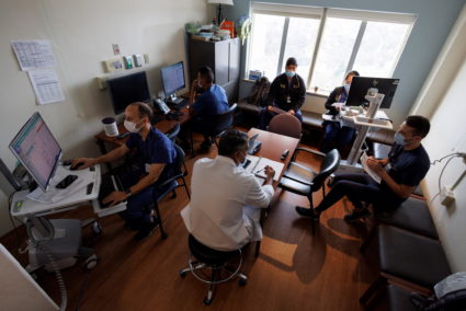 Dr. Vishal Bansalmakes his morning rounds as head of the trauma unit at Scripps Mercy Hospital in San Diego