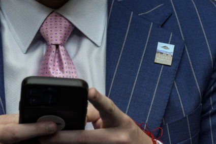 A member of the audience wears a pin that says "I Still Want To Believe" during a House Oversight Committee hearing titled "Unidentified Anomalous Phenomena: Implications on National Security, Public Safety, and Government Transparency" on Capitol Hill 26, 2023 in Washington, DC. Several witnesses are testifying about their experience with possible UFO encounters and discussion about a potential covert government program concerning debris from crashed, non-human origin spacecraft. Photo by Drew Angerer/Getty Images