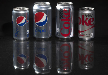 Regular and mini cans of Diet Coke and Diet Pepsi are pictured in this photo illustration in New York
