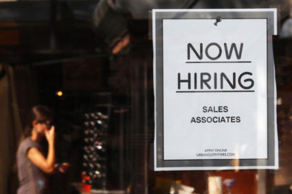 A "Now Hiring" sign hangs on the door to the Urban Outfitters store at Quincy Market in Boston, Massachusetts September 5, 2014. U.S. employers hired the fewest number of workers in eight months in August and more Americans gave up the hunt for jobs, providing a cautious Federal Reserve with more reasons to wait longer before raising interest rates. Nonfarm payrolls increased 142,000 last month after expanding by 212,000 in July, the Labor Department said on Friday. The jobless rate fell one-tenth of a percentage point to 6.1 percent, partly because people dropped out of the labor force. Photo by Brian Snyder/REUTERS