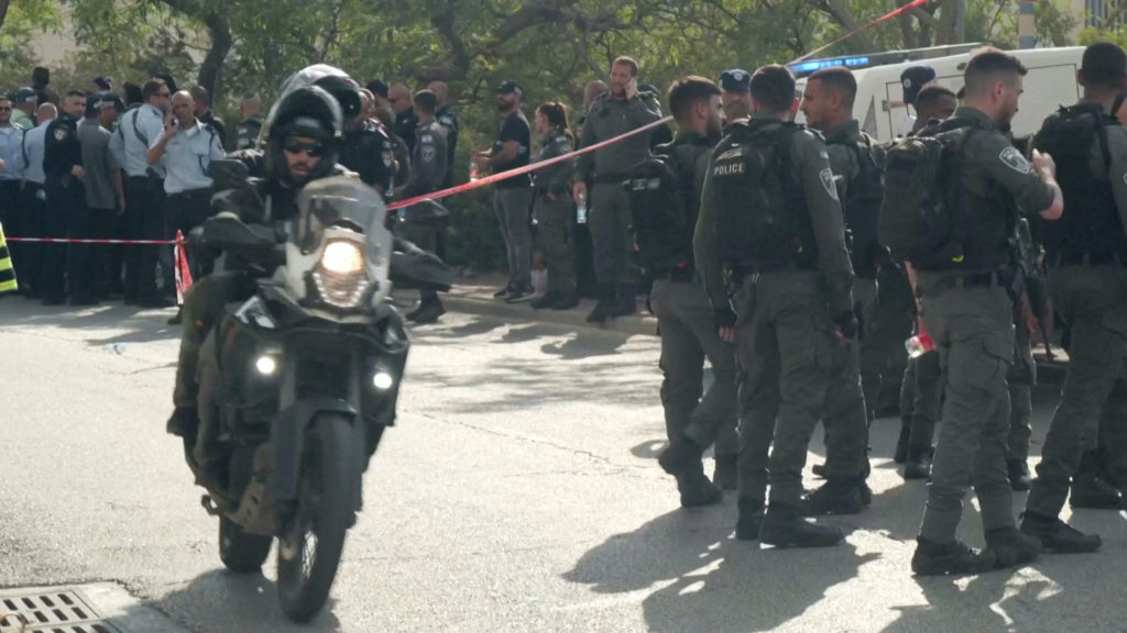 Israeli forces arrive at the scene of a shooting at Maale Adumim settlement, in the Israeli-occupied West Bank, August 1, ...