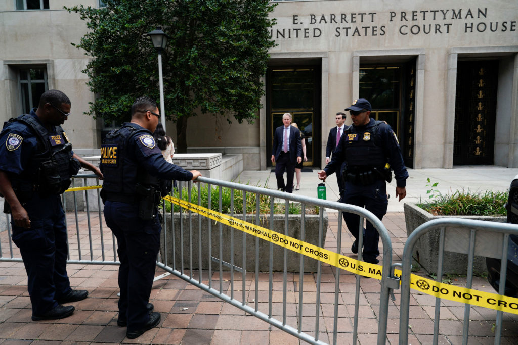 Security forces stand guard outside E. Barrett Prettyman United States Courthouse on the day former U.S. President Donald Trump, who is facing federal charges related to attempts to overturn his 2020 election defeat, appears at the U.S. District Court in Washington, U.S., August 3, 2023. Photo by Joshua Roberts/REUTERS