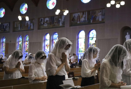 Local residents pray for victims of the 1945 atomic bombing during a mass on the 78th anniversary of the bombing of Nagasaki, at the Urakami Cathedral in Nagasaki, Japan, August 9, 2023. Photo by Kyodo via REUTERS