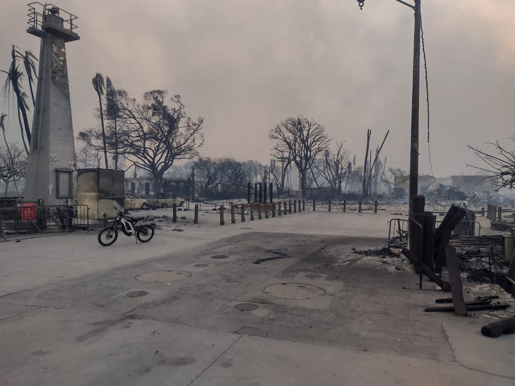 Buildings smolder after a wildfire devastated the Maui city of Lahaina