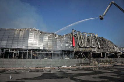 Rescuers work at a site of a shopping mall destroyed during a Russian military strike, amid Russia's attack on Ukraine, in Odesa, Ukraine August 14, 2023. Photo by Nina Liashonok/REUTERS
