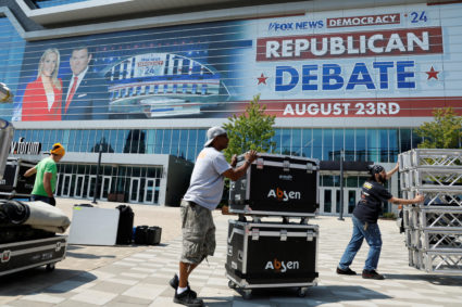 Workers make preparations outside the debate hall for Republican U.S. presidential candidates to gather for their first primary debate of the 2024 presidential campaign in Milwaukee, Wisconsin, U.S. August 22, 2023. Photo by Jonathan Ernst/REUTERS