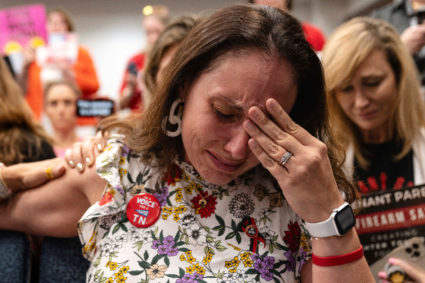Abbey McClain, a Covenant School mom, cries in the House hearing room during a House education administration committee after things became heated over Tennessee House Bill 7064, which would permit guns to be carried on school campus, grounds and recreation areas by active duty or retired law enforcement officers and military members, on the third day of the special session on public safety to discuss gun violence in the wake of Covenant School shooting in Nashville, Tennessee, U.S., August 23, 2023. Photo by Cheney Orr/REUTERS