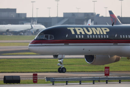 Former U.S. President Donald Trump arrives at Atlanta Hartsfield-Jackson International Airport to turn himself in to be processed at Fulton County Jail after his Georgia indictment, in Atlanta, Georgia, U.S., August 24, 2023. Photo by Ricardo Arduengo/REUTERS
