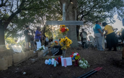 Mourners attend a prayer vigil in Jacksonville