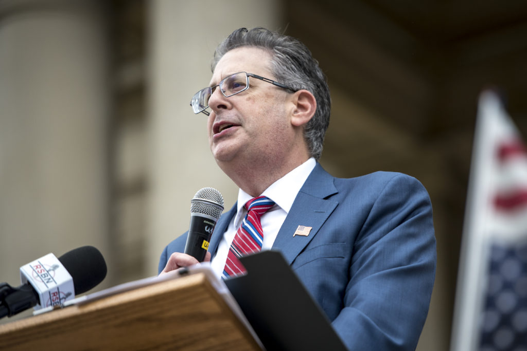 Matthew DePerno speaks at the Michigan State Capitol on October 12, 2021 in Lansing, Michigan. Several hundred demonstrators gathered at the capitol demanding a forensic audit of the 2020 U.S. presidential election. Photo by Nic Antaya/Getty Images