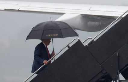 Former U.S. President Donald Trump boards his plane at Reagan National Airport following an arraignment in Washington, D.C. federal court on August 3, 2023 in Arlington, Virginia. Photo by Win McNamee/Getty Images
