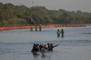 Migrants search entry point into United States in Eagle Pass, Texas
