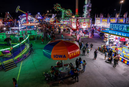 Fairgoers attend the Iowa State Fair in Des Moines