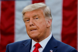 U.S. President Donald Trump delivers an update on the so-called Operation Warp Speed program, the joint Defense Department and HHS initiative that has struck deals with several drugmakers in an effort to help speed up the search for effective treatments for the ongoing coronavirus disease (COVID-19) pandemic, in an address from the Rose Garden at the White House in Washington, U.S., November 13, 2020. Photo by Carlos Barria/REUTERS
