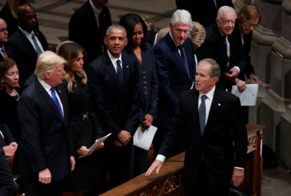 U.S. President George W. Bush walks past former presidents as he arrives at state funeral for his father former U.S. Presi...